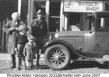 Taloga barber shop, owner Earl Alden, about 195
